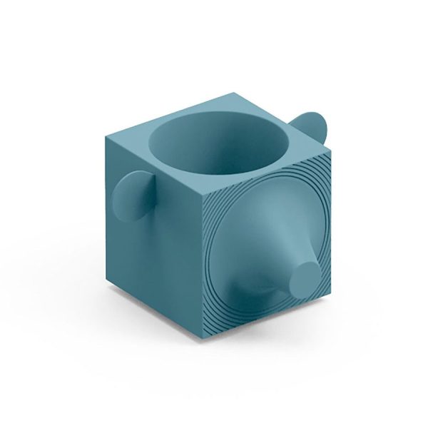 Portaoggetti o portavaso color zaffiro. Capo oggetto di design in polietilene realizzato da Lyxo simile a un orso.