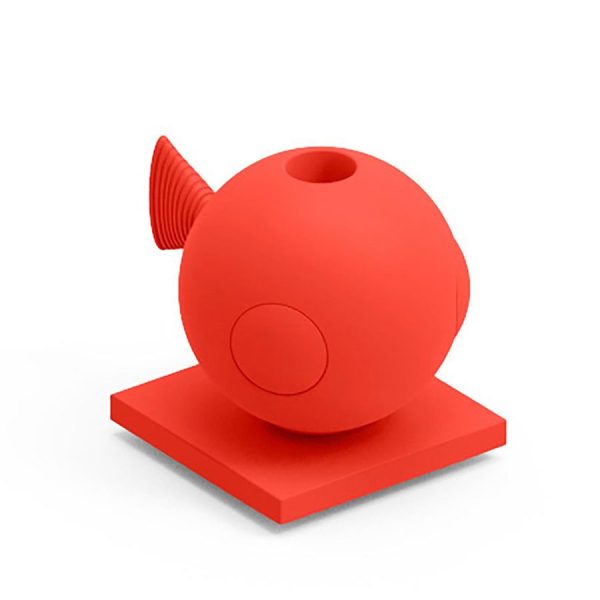 Portaoggetti o portavaso color corallo. Fugu oggetto di design in polietilene realizzato da Lyxo simile a un orso.